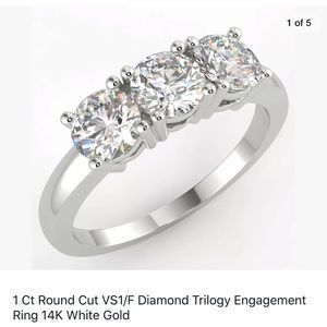 Diamond trilogy ring